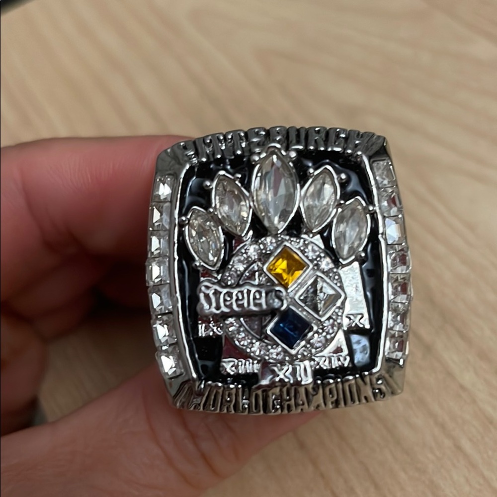Silver and Black Jewelry Rings with Intricate Metalwork